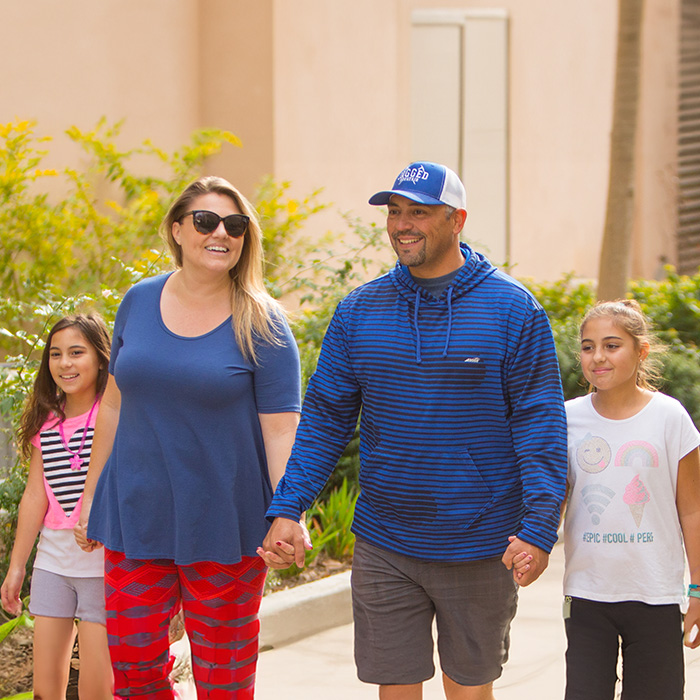 Family walking 
 at Balboa park