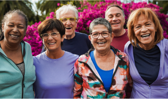 A group of older adults smiling.